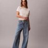 Baggy-Jeans mit niedriger Leibhöhe und Gürtel Baggy-Jeans mit niedriger Leibhöhe und Gürtel
