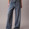 Baggy-Jeans mit niedriger Leibhöhe und Gürtel Baggy-Jeans mit niedriger Leibhöhe und Gürtel