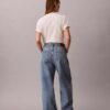 Baggy-Jeans mit niedriger Leibhöhe und Gürtel Baggy-Jeans mit niedriger Leibhöhe und Gürtel