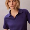 Baumwoll-Polo-Shirt mit konturierten Rippbündchen Baumwoll-Polo-Shirt mit konturierten Rippbündchen