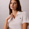 Baumwoll-Polo-Shirt mit konturierten Rippbündchen Baumwoll-Polo-Shirt mit konturierten Rippbündchen