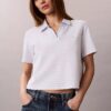 Baumwoll-Polo-Shirt mit konturierten Rippbündchen Baumwoll-Polo-Shirt mit konturierten Rippbündchen