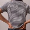 Baumwoll-Polo-Shirt mit konturierten Rippbündchen Baumwoll-Polo-Shirt mit konturierten Rippbündchen