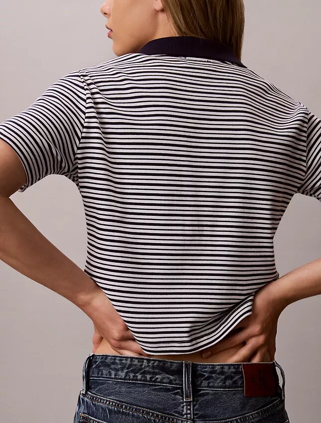 Baumwoll-Polo-Shirt mit konturierten Rippbündchen Baumwoll-Polo-Shirt mit konturierten Rippbündchen