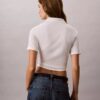 Baumwoll-Polo-Shirt mit konturierten Rippbündchen Baumwoll-Polo-Shirt mit konturierten Rippbündchen