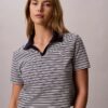 Baumwoll-Polo-Shirt mit konturierten Rippbündchen Baumwoll-Polo-Shirt mit konturierten Rippbündchen