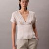 Bedruckte Satinbluse mit V-Ausschnitt Bedruckte Satinbluse mit V-Ausschnitt