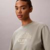 Boxy-T-Shirt mit Bogen-Logo-Grafik Boxy-T-Shirt mit Bogen-Logo-Grafik