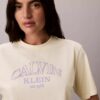 Boxy-T-Shirt mit Bogen-Logo-Grafik Boxy-T-Shirt mit Bogen-Logo-Grafik