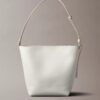 Bucket Bag mit durchgehendem Emblem-Logo und Beutel Bucket Bag mit durchgehendem Emblem-Logo und Beutel