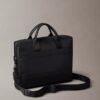 Commuter-Tasche mit geprägtem Monogram Commuter-Tasche mit geprägtem Monogram
