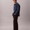 Denim-Overshirt mit durchgehendem Monogram im 90er-Jahre-Stil Denim-Overshirt mit durchgehendem Monogram im 90er-Jahre-Stil
