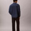 Denim-Overshirt mit durchgehendem Monogram im 90er-Jahre-Stil Denim-Overshirt mit durchgehendem Monogram im 90er-Jahre-Stil