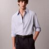 Einfarbiges, locker sitzendes Button-Down-Hemd aus Baumwolle Einfarbiges, locker sitzendes Button-Down-Hemd aus Baumwolle