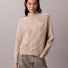 Feinstrick-Pullover mit lockerem Rollkragen Feinstrick-Pullover mit lockerem Rollkragen