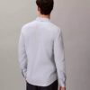 Geometrisches Jacquard-Hemd mit schmaler Passform und Button-Down-Kragen Geometrisches Jacquard-Hemd mit schmaler Passform und Button-Down-Kragen