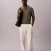 Geripptes Sweater-Poloshirt Geripptes Sweater-Poloshirt