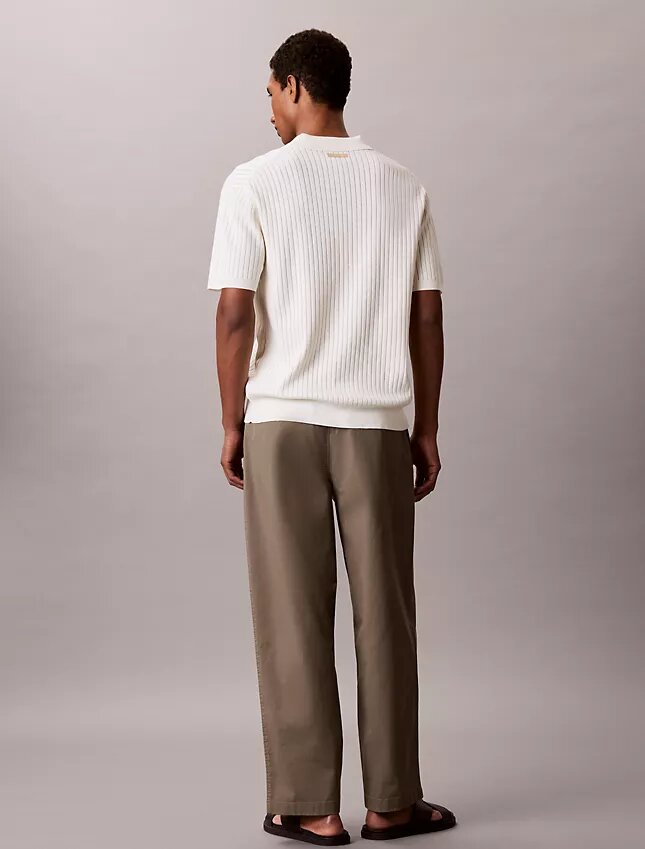 Geripptes Sweater-Poloshirt Geripptes Sweater-Poloshirt