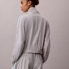 Jacke mit gewebtem Commuter-Logo