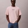 Klassisches T-Shirt mit Rundhalsausschnitt und Logo-Grafik in verwaschener Optik Klassisches T-Shirt mit Rundhalsausschnitt und Logo-Grafik in verwaschener Optik