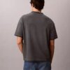 Klassisches T-Shirt mit Rundhalsausschnitt und Logo-Grafik in verwaschener Optik Klassisches T-Shirt mit Rundhalsausschnitt und Logo-Grafik in verwaschener Optik