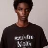 Klassisches T-Shirt mit Schatten-Logo-Grafik Klassisches T-Shirt mit Schatten-Logo-Grafik