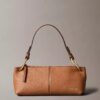 Kleine, lässige, wandelbare Ledertasche