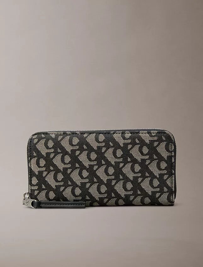 Lange Reißverschluss-Geldbörse mit durchgehendem Monogram Lange Reißverschluss-Geldbörse mit durchgehendem Monogram