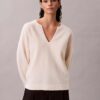 Locker sitzender Pullover aus Merinowolle mit V-Ausschnitt Locker sitzender Pullover aus Merinowolle mit V-Ausschnitt