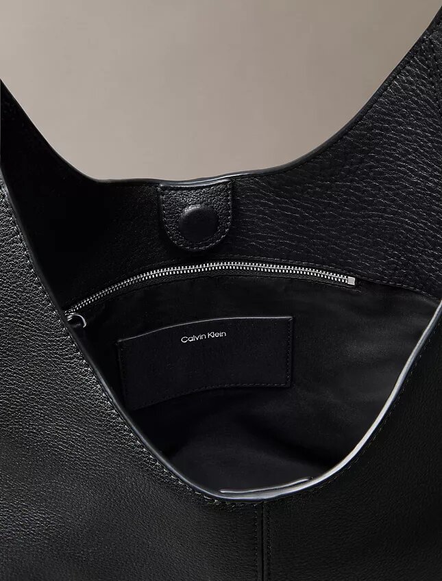 Lässige mittelgroße Umhängetasche aus Leder Lässige mittelgroße Umhängetasche aus Leder