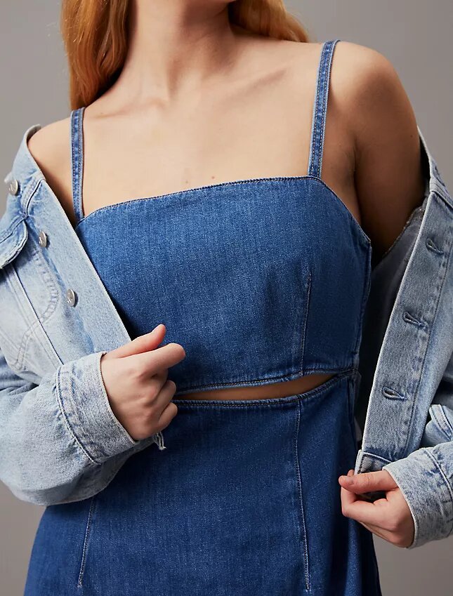 Mini-Kleid aus Denim mit Cut-outs Mini-Kleid aus Denim mit Cut-outs