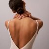 Minimalistischer Bodys aus Mesh bis zur Mitte des Oberschenkels Minimalistischer Bodys aus Mesh bis zur Mitte des Oberschenkels