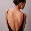 Minimalistischer Bodys aus Mesh bis zur Mitte des Oberschenkels Minimalistischer Bodys aus Mesh bis zur Mitte des Oberschenkels