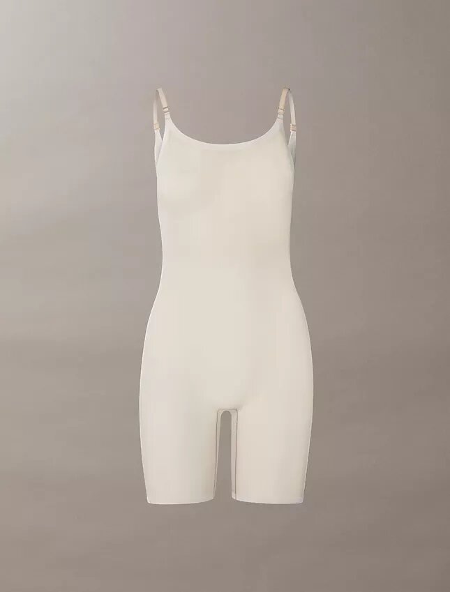 Minimalistischer Bodys aus Mesh bis zur Mitte des Oberschenkels Minimalistischer Bodys aus Mesh bis zur Mitte des Oberschenkels