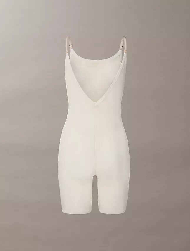 Minimalistischer Bodys aus Mesh bis zur Mitte des Oberschenkels Minimalistischer Bodys aus Mesh bis zur Mitte des Oberschenkels