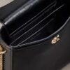 Monogram-Satteltasche mit Kette Monogram-Satteltasche mit Kette