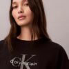 Monologo Cropped T-Shirt mit gerader Silhouette Monologo Cropped T-Shirt mit gerader Silhouette