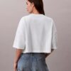 Monologo Cropped T-Shirt mit gerader Silhouette Monologo Cropped T-Shirt mit gerader Silhouette