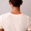 Nahtloses T-Shirt mit geripptem Emblem Nahtloses T-Shirt mit geripptem Emblem