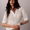 Polo-Shirt aus offenem Strick Polo-Shirt aus offenem Strick