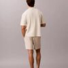 Pullover mit Knopfleiste und Netzstruktur Pullover mit Knopfleiste und Netzstruktur