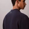 Pullover mit Knopfleiste und Netzstruktur Pullover mit Knopfleiste und Netzstruktur