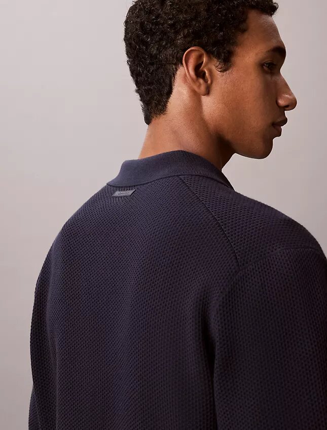 Pullover mit Knopfleiste und Netzstruktur Pullover mit Knopfleiste und Netzstruktur