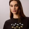 Schmal geschnittenes T-Shirt mit gestuftem Logo-Print Schmal geschnittenes T-Shirt mit gestuftem Logo-Print