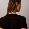Schmal geschnittenes T-Shirt mit gestuftem Logo-Print Schmal geschnittenes T-Shirt mit gestuftem Logo-Print