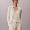 Set aus Baumwoll-Ripp-Strickjacke und Tanktop Set aus Baumwoll-Ripp-Strickjacke und Tanktop