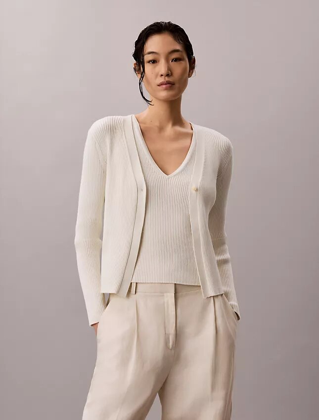 Set aus Baumwoll-Ripp-Strickjacke und Tanktop Set aus Baumwoll-Ripp-Strickjacke und Tanktop