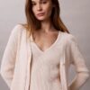 Set aus Baumwoll-Ripp-Strickjacke und Tanktop Set aus Baumwoll-Ripp-Strickjacke und Tanktop
