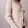 Set aus Baumwoll-Ripp-Strickjacke und Tanktop Set aus Baumwoll-Ripp-Strickjacke und Tanktop