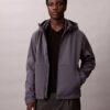 Softshell-Jacke mit Kapuze und Reißverschluss Softshell-Jacke mit Kapuze und Reißverschluss